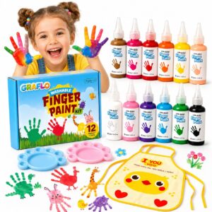 Smiling girl with paint-covered hands behind the GRAFLO washable finger paint box and all 12 colour bottles, with two paw-shaped palettes and a chick apron