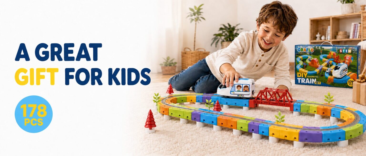 A boy playing with the assembled 178-piece track, with the gift-boxed set beside him