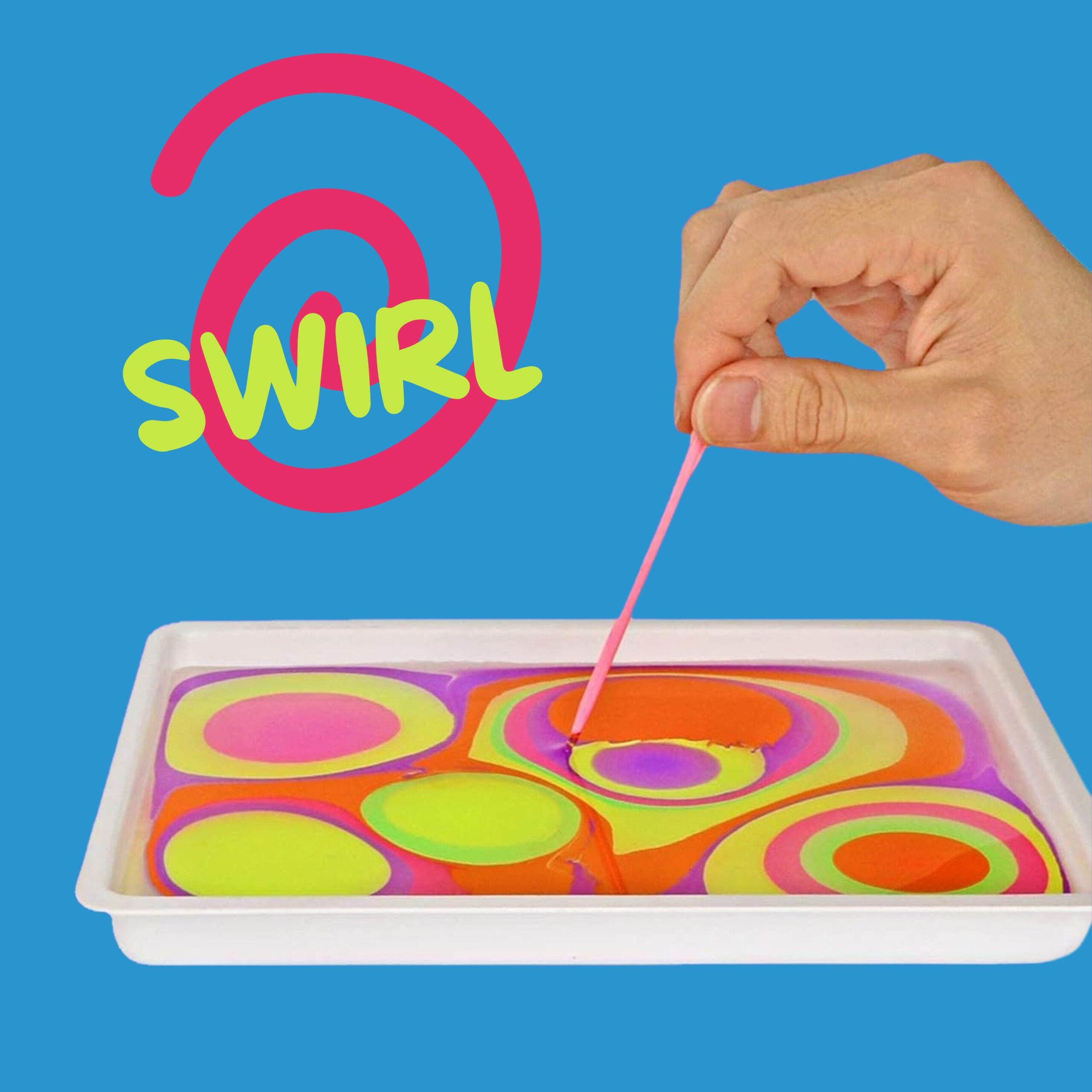 Swirl: a hand drawing a needle through floating marbling paint to create a pattern