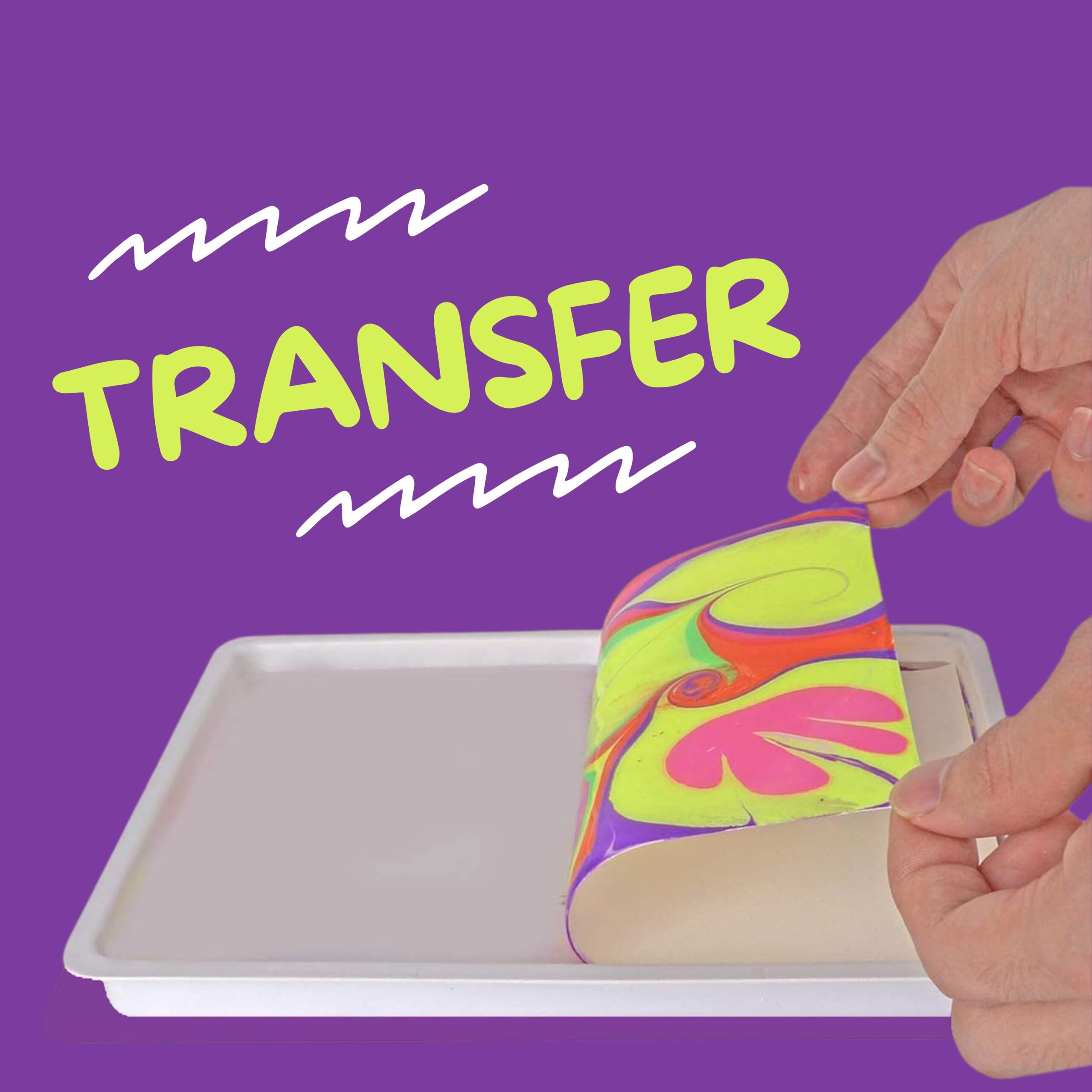 Transfer: hands lifting a finished marbled print from the water tray