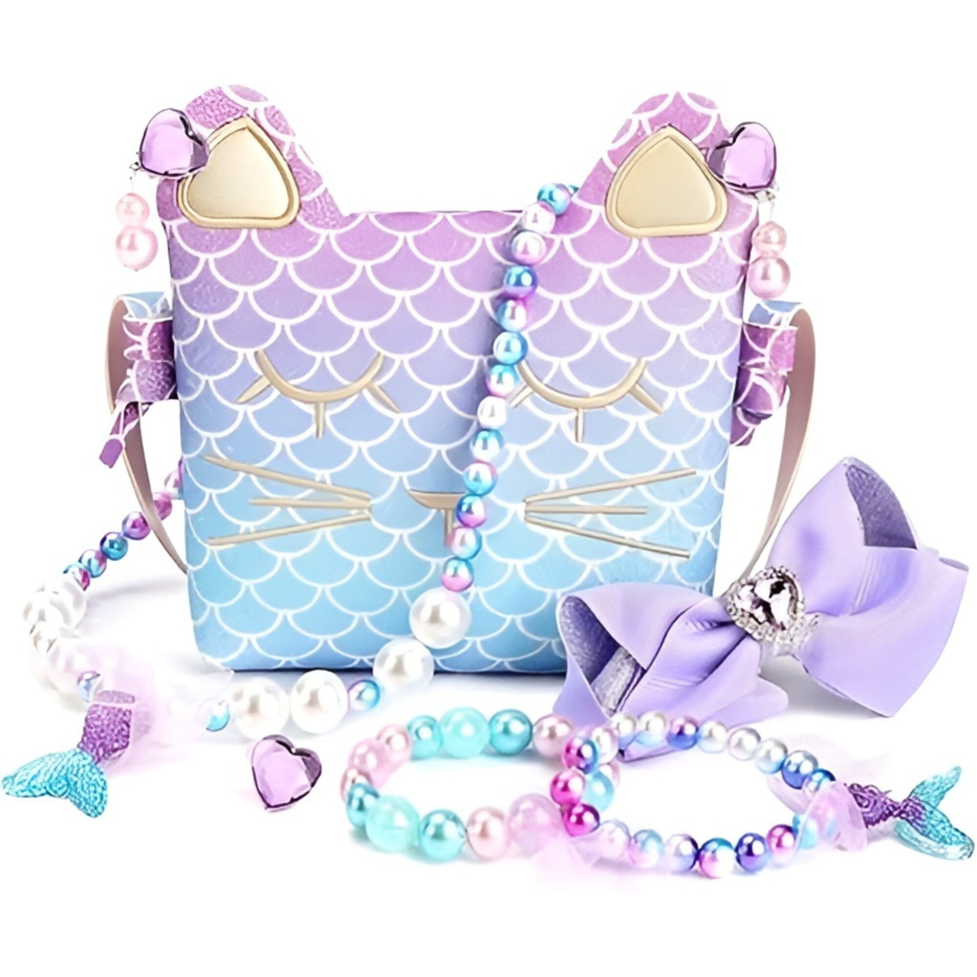 The mermaid-scale cat-face purse standing upright with the beaded necklace, bracelet, lilac hair bow and heart ring arranged around it on a white background