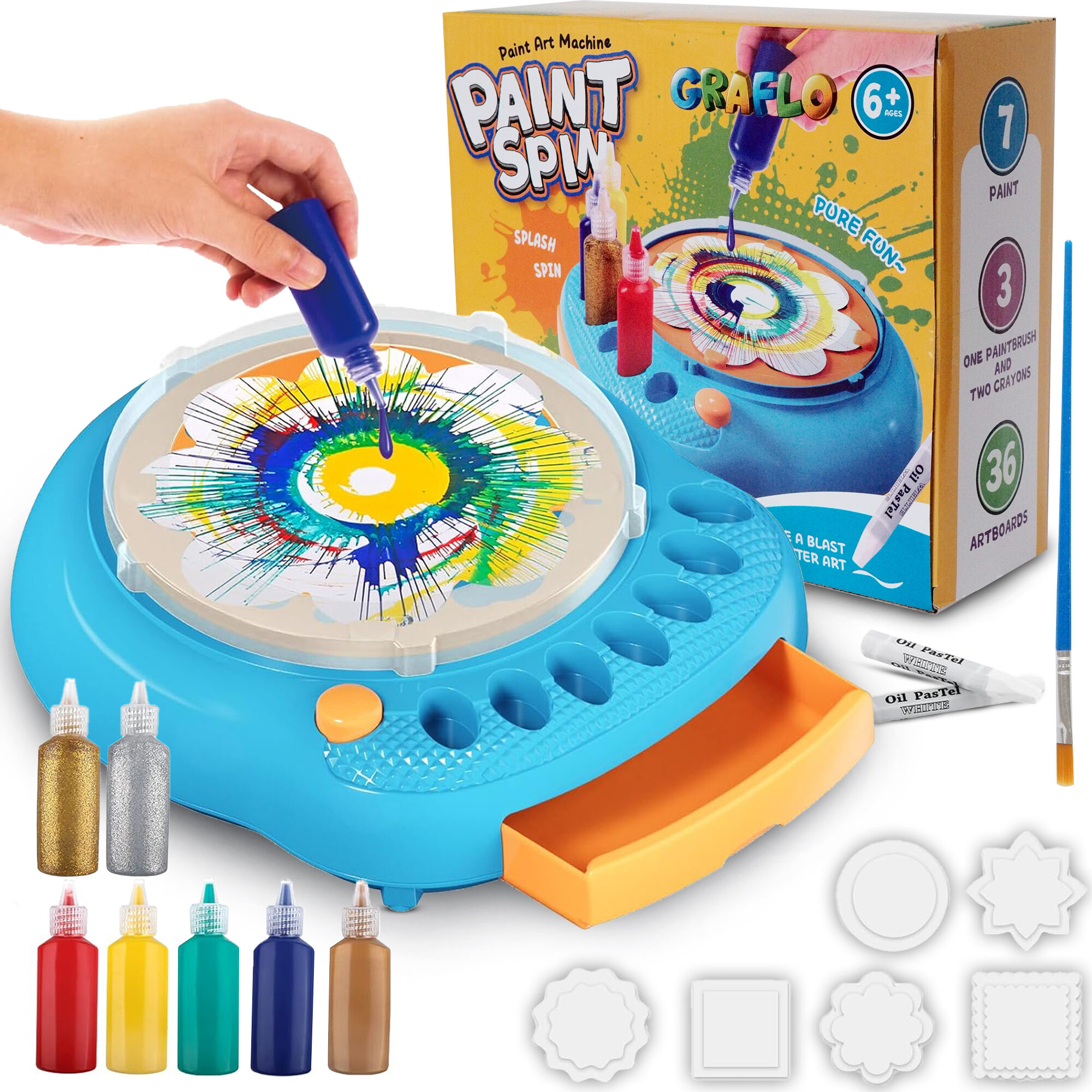 GRAFLO Paint Spin art machine with a spin painting on the plate, shown with the retail box, paint bottles, oil pastels, brush and artboard shapes