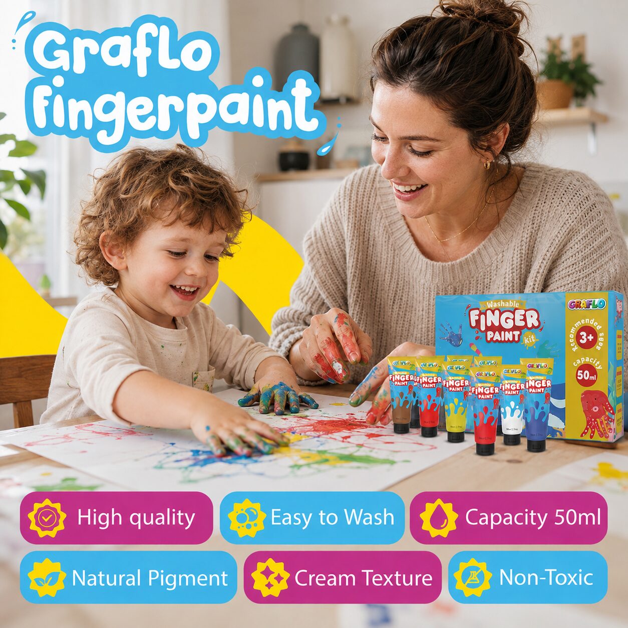 GRAFLO fingerpaint: a toddler finger painting at a table with the kit box and tubes, badged high quality, easy to wash, 50 ml capacity, natural pigment, cream texture and non-toxic