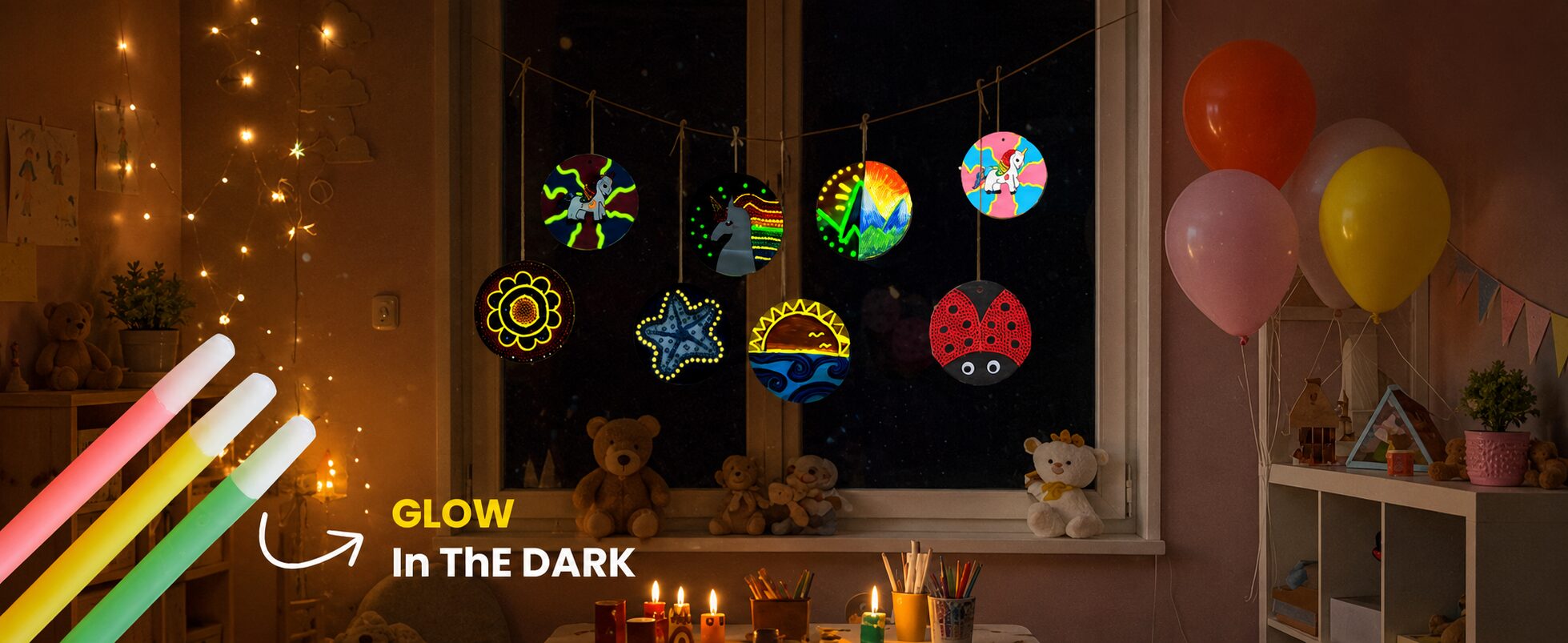 Painted wood slices glowing in the dark, hung across a window at night with fairy lights and balloons