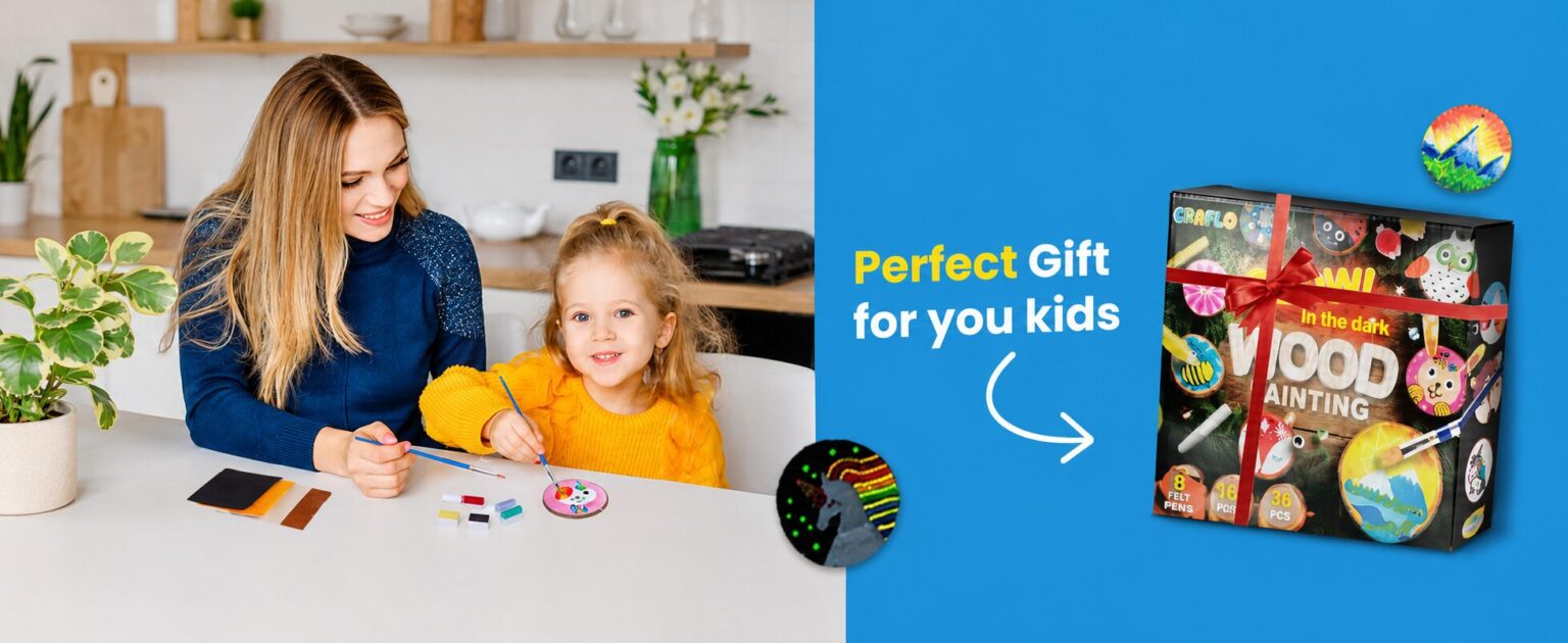 Perfect gift for your kids: a mother and daughter painting wood slices at a table beside the gift-wrapped GRAFLO wood painting box