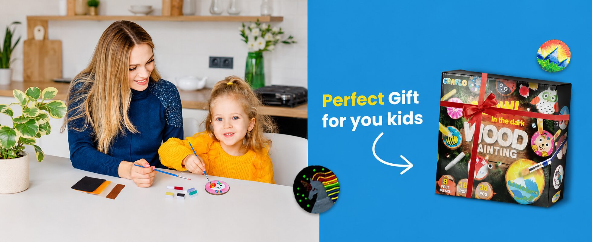 Perfect gift for your kids: a mother and daughter painting wood slices at a table beside the gift-wrapped GRAFLO wood painting box
